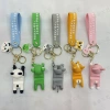 Cartoon character keychains, creative phone stands, car key pendants, cute couple bags and accessories Application Scenario